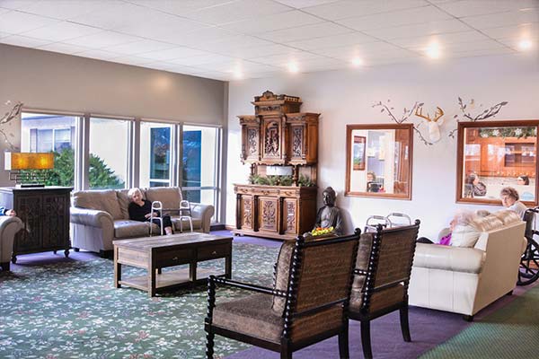 Gardens common area with residents lounging