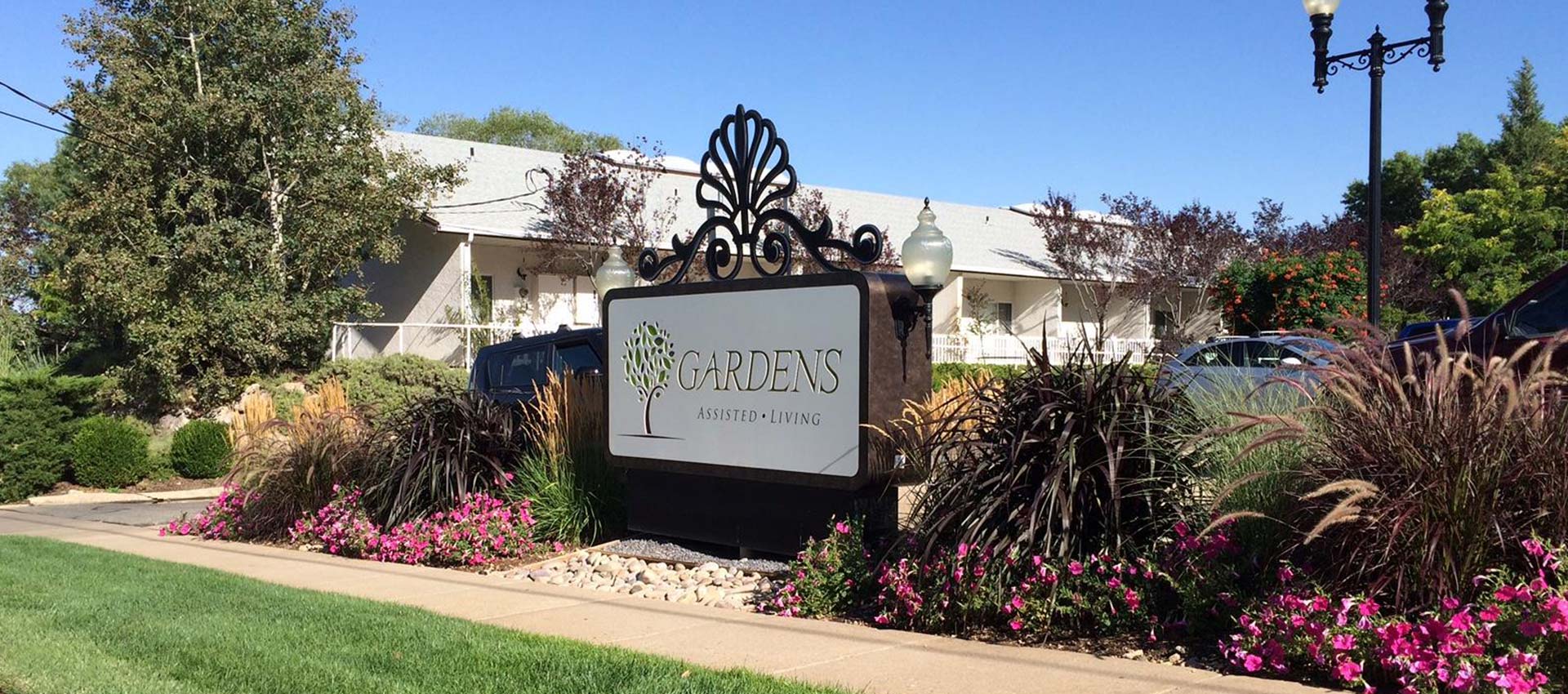Outdoor front sign for Gardens Assisted Living